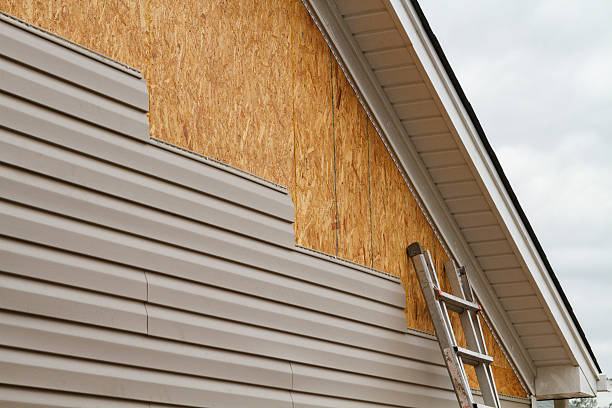 Professional Emergency Siding Repair technician working in Mount Victory, OH